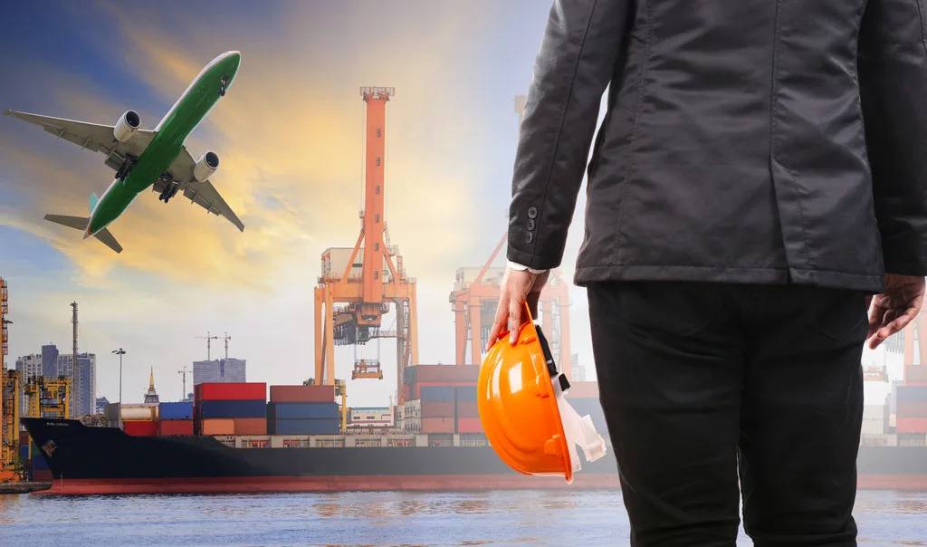 working man on duty in container ship port corgo logistic use for shipping and freight service business