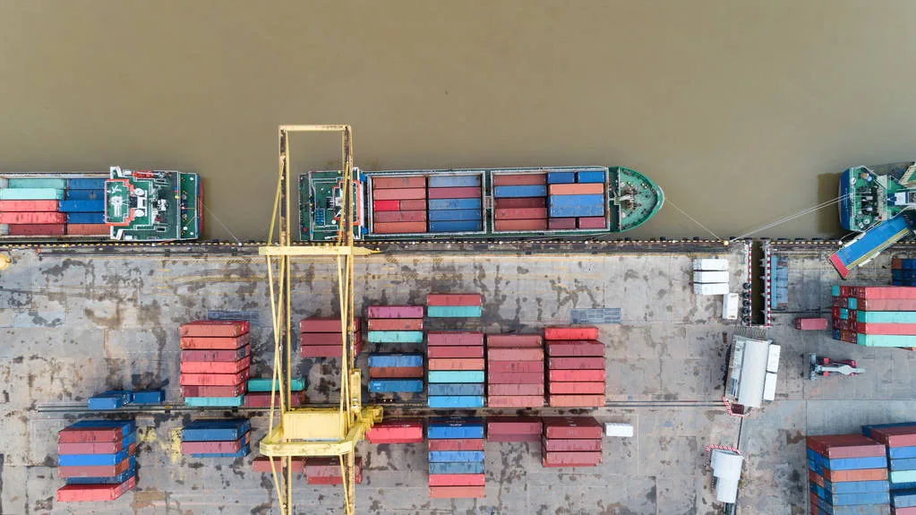 Aerial view drone shot of Container ship in export and import lo